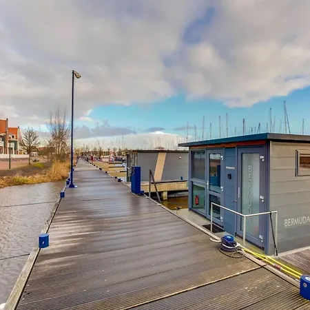 Modern Houseboat In Marina Of * Volendam