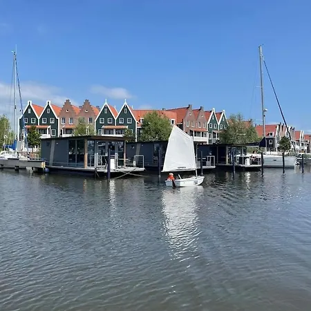 Modern Houseboat In Marina Of